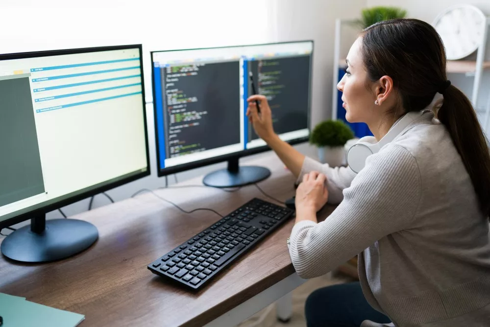 woman working on programming